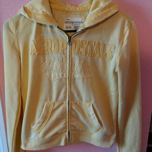 yellow zip sweater